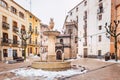 Bocairent, Spain - January 22, 2020: Town hall square of the rural town of Bocairente, in Valencia, after a snowfall in winter