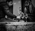 Boccadasse, Italy - April 21, 2016: Dating on young people couple . Usually the bars and restaurants are full of customers and