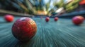 A bocce ball making the critical hit, with the other balls and the pallino in a strategic blur in the background Royalty Free Stock Photo