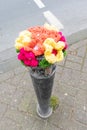 A knitted bouquet of flowers as an outdoor pole topper in Bochum, Germany