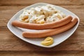 Bockwurst with potato salad and mustard Royalty Free Stock Photo