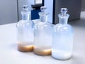 BOD bottle for analysis Biochemical Oxygen Demand in waste water sample, precipitation with solvent in flask.