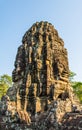 Bodhisattva face tower at Bayon castle. Royalty Free Stock Photo