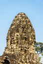 Bodhisattva face tower at Bayon castle. Royalty Free Stock Photo