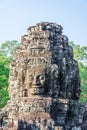 Bodhisattva face tower at Bayon castle. Royalty Free Stock Photo