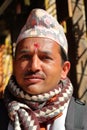 BODHNATH, NEPAL - DECEMBER 24, 2014: Portrait of a Nepalese man wearing Dhaka Topi traditional Nepalese hat at Ichangu Narayan T