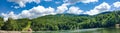 Bodi lake in Maramures, Romania - Panoramic view. Summer landscape