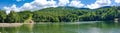 Bodi lake in Maramures, Romania - Panoramic view. Summer landscape