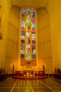 Bodo, Norway - April 09, 2018: Indoor view of the Bodo cathedral with colorful stained glass in Nordland county