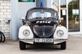 Volkswagen beetle vintage police car at the entrance of the police department in Bodo, Norway