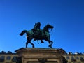 Bodoni square in Turin, statue, hourse, sky and buildings