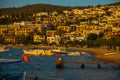 BODRUM, TURKEY: Cityscape on the boardwalk with boat view in the evening at sunset in Bodrum.