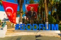 BODRUM, TURKEY: Huge blue letters of Bodrum, the sign and the name of the city of Bodrumon a sunny day.