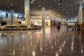 Bodrum, Turkey - August, 2020: Arrivals hall with glittering store windows of Duty Free stores at Bodrum airport