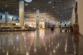 Bodrum, Turkey - August, 2020: Arrivals hall with glittering store windows of Duty Free stores at Bodrum airport