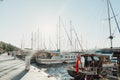 Bodrum. Turkey CIRCA 2022. Marina for yachts and ships with boats in Bodrum in the rays of an elephant sunset. Ideas for