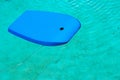 Body board floating in pool