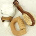 Body brush, wooden massager and cotton balls. Conceptual image shot