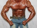 Body builder poses in the most muscular pose Royalty Free Stock Photo