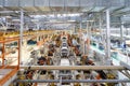 Body of car on conveyor Modern Assembly of cars at plant. automated build process of car body