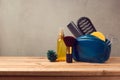 Body care and beauty products on wooden table over gray background Royalty Free Stock Photo