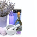 Oil, salt, cream, soap and dried lavender flowers isolated on a white background. Free space for text Royalty Free Stock Photo