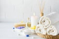 Body care set for peeling. With towel,white lily, sea salt, bath oil, sugar body scrub, massage brush Royalty Free Stock Photo