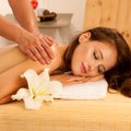 Body care. Spa body massage treatment. Woman having massage in the spa salon Royalty Free Stock Photo