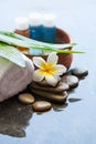 Body care and spa concept with bottles with flower Royalty Free Stock Photo