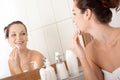 Body care - Young woman clean her face