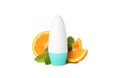 Body deodorants roll-on and orange slices isolated on background Royalty Free Stock Photo
