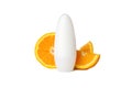Body deodorants roll-on and orange slices isolated on background Royalty Free Stock Photo