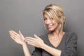 Body language concept for welcoming blond woman Royalty Free Stock Photo