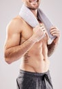 Body, man and abdomen, fitness with beauty and grooming, hygiene with health and clean on studio background. Happy