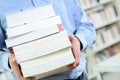 Body man holding stack books Royalty Free Stock Photo