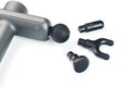 Body massager with various attachments on a white background