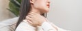 Body muscles stiff problem, asian young attractive woman, girl pain with neck pain ache from work, holding massaging rubbing