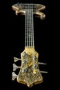 Focus on Headstock and Tuning Gears of a Buckeye Burl Wood Five String Electric Bass Guitar Royalty Free Stock Photo