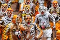 Body painted people perform `tiger dance`