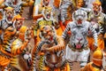 Body painted people perform `tiger dance`