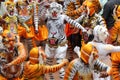 Body painted people perform `tiger dance`