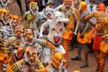 Body painted people perform `tiger dance`