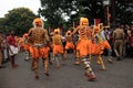 Body painted people perform `tiger dance`