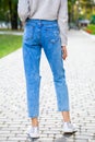 female legs blue jeans