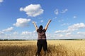Overweight woman jumping high at sky background