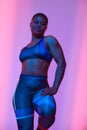 Body Positivity And Sport. Smiling Curvy Black Woman In Sportswear Free Copy Space For Advertisement, Standing Isolated