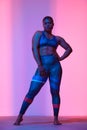 Body Positivity And Sport. Smiling Curvy Black Woman In Sportswear Free Copy Space For Advertisement, Standing Isolated