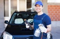 Body repairer holding a spray gun