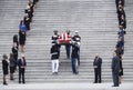 The body of Ruth Bader Ginsburg is carried down the steps of the Capitol, flanked by t Royalty Free Stock Photo