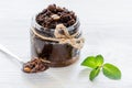 Body scrub of ground coffee on white table background Royalty Free Stock Photo